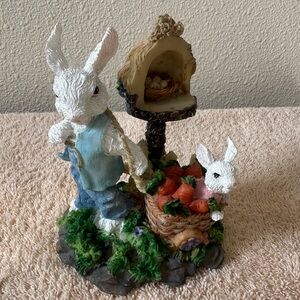 Vintage Resin Rabbits In Garden.